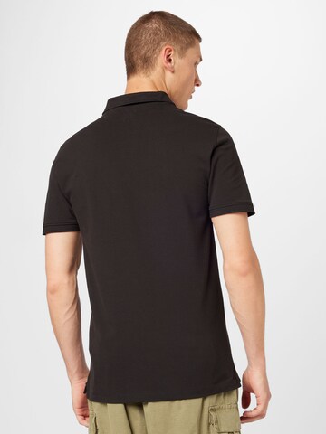 LEVI'S ® Poloshirt 'Housemark' in Schwarz