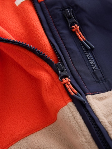 Next Fleece jas in Oranje