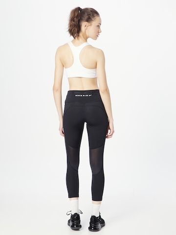 Skinny Pantaloni sport 'Air Fast' de la NIKE pe negru