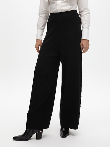 Wide leg Pantaloni di Lola Casademunt in nero