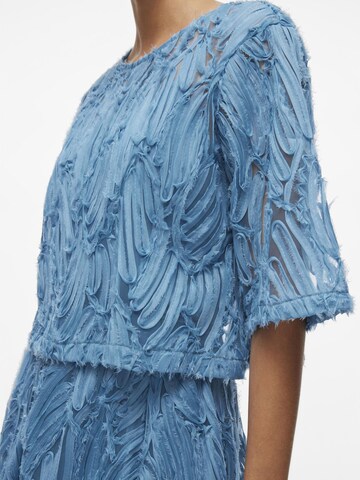 ROUGE EDIT Top in Blau