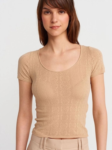 Pullover di Dilvin in beige