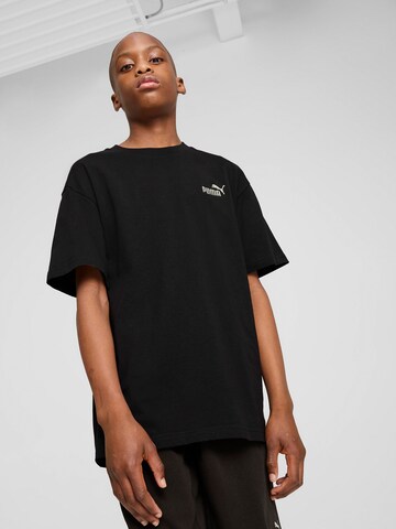 PUMA - Camiseta 'ESS No. 1' en negro: frente