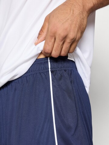 UNDER ARMOUR Loosefit Sportbroek 'Challenger' in Blauw