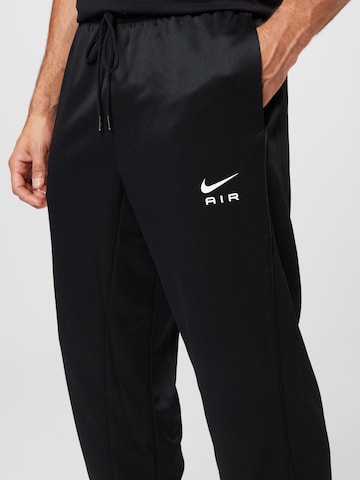 Nike Sportswear Дънки Tapered Leg Панталон в черно