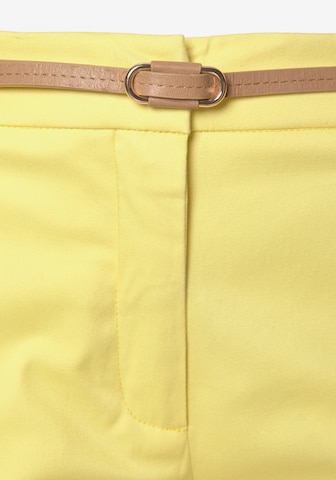 VIVANCE - Slimfit Pantalón chino en amarillo