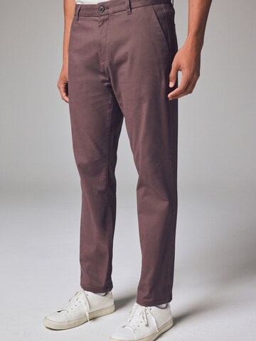 Next Slimfit Chinohousut värissä lila: etupuoli