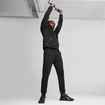 Effilé Pantalon de sport PUMA en noir