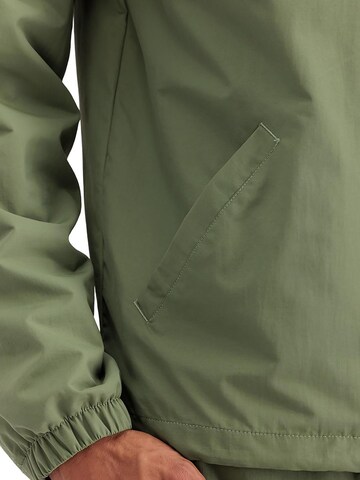 ALPHA INDUSTRIES Between-Season Jacket 'Expedition' in Green