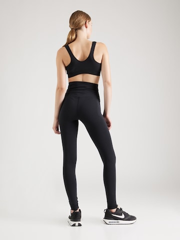 Skinny Pantaloni sport 'Meridian' de la UNDER ARMOUR pe negru
