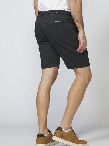 Slimfit Pantaloni di KOROSHI in nero