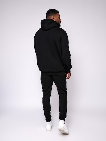 Pull-over 'Essential Oversized Hoodie' Fortex Fitness en noir