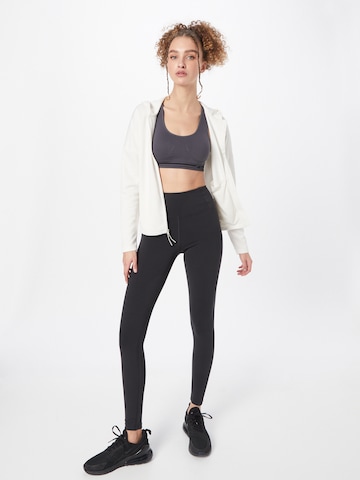 Girlfriend Collective Skinny Športne hlače | črna barva