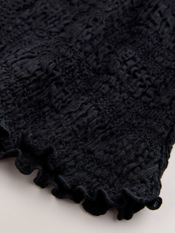 Next - Blusa en negro