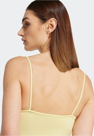ADIDAS ORIGINALS - Top en amarillo
