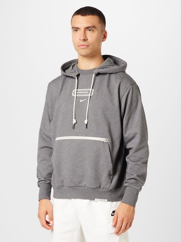 NIKE - Sweatshirt de desporto em cinzento: frente