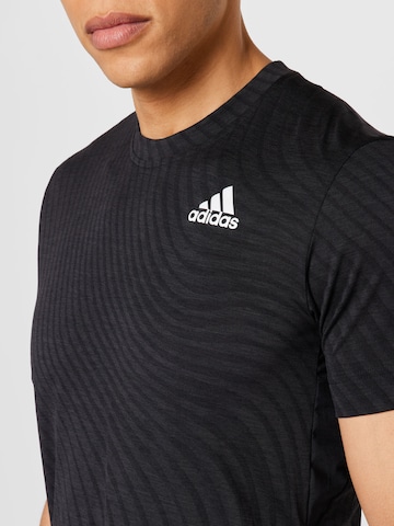 ADIDAS SPORTSWEAR - Camisa funcionais 'Freelift' em preto