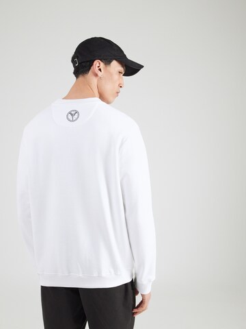 Bluză de molton de la Carlo Colucci pe alb: spate