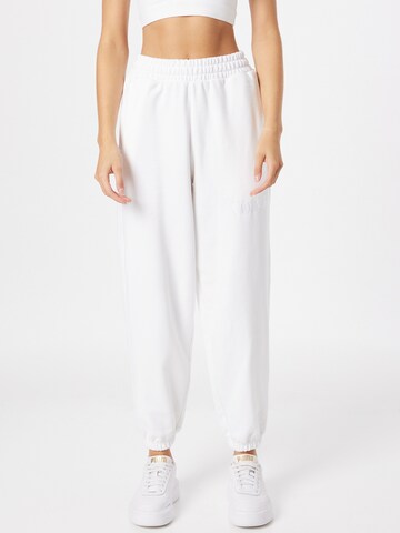 PUMA Tapered Pants in White: front