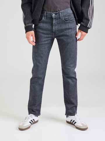 LEVI'S ® Tapered Jeans '502' in Blue: front