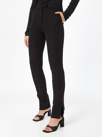 TOMMY HILFIGER - Slimfit Pantalón de pinzas 'Gabardine' en negro: frente