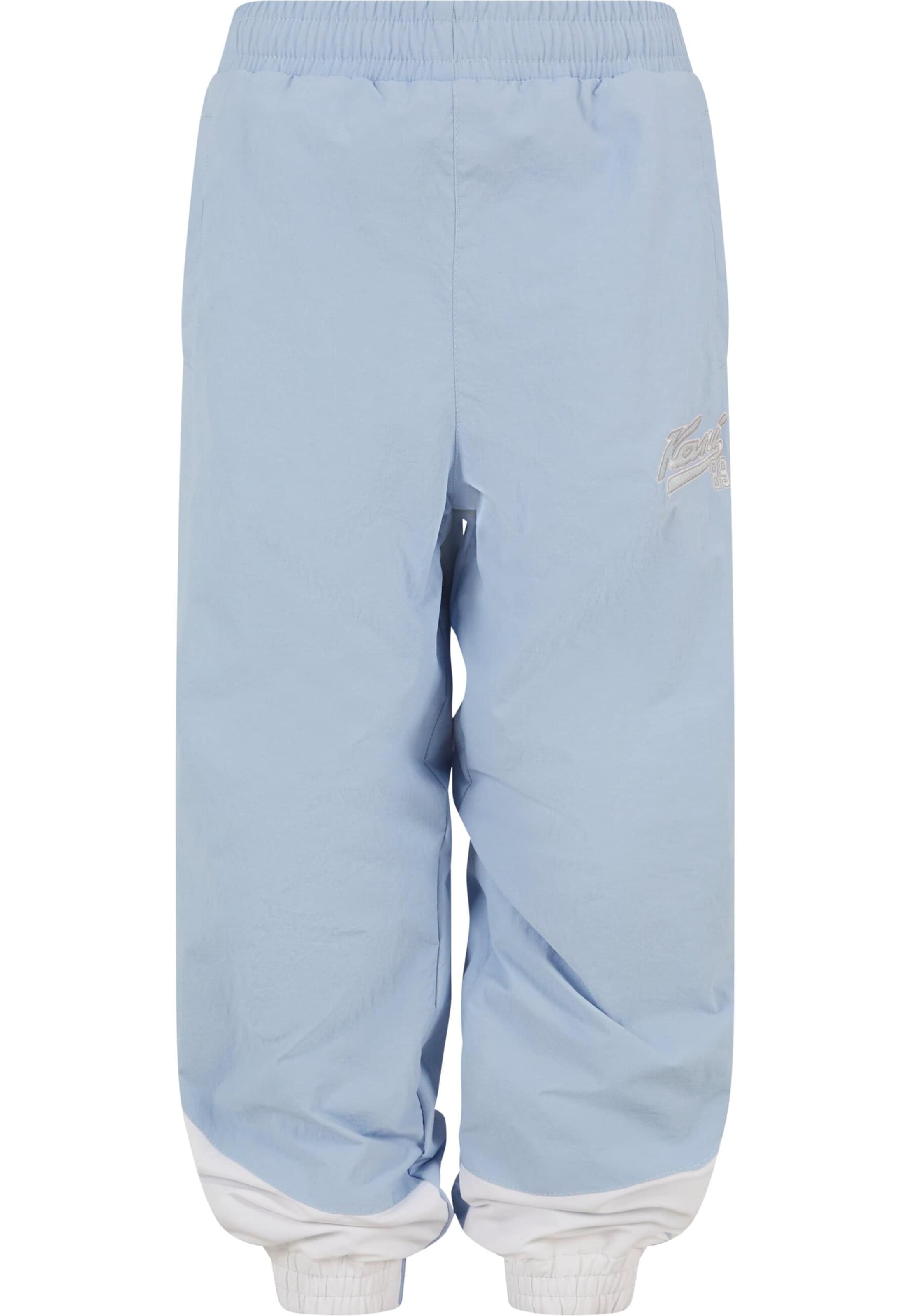 Karl Kani Tapered Trousers 'Varsity' in Blue: front
