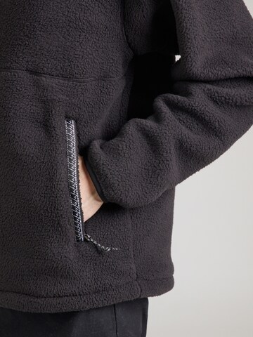 Veste de survêtement 'FLEESKI' THE NORTH FACE en noir
