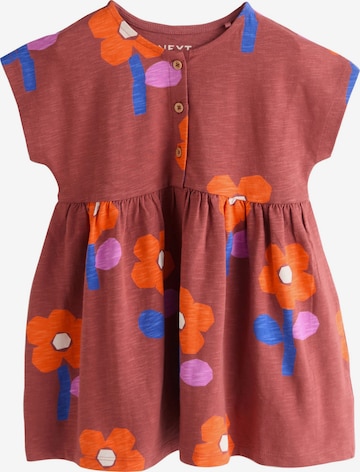Next Mekko värissä oranssi: etupuoli