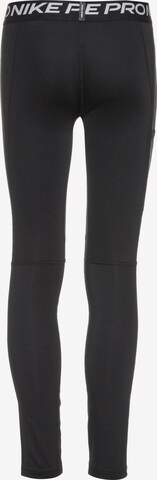 NIKE Skinny Sportbroek in Zwart