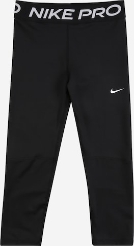 NIKE Skinny Sports trousers in Black: front