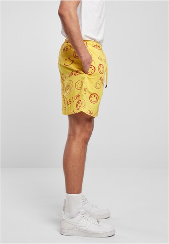 Karl Kani Loose fit Pants in Yellow