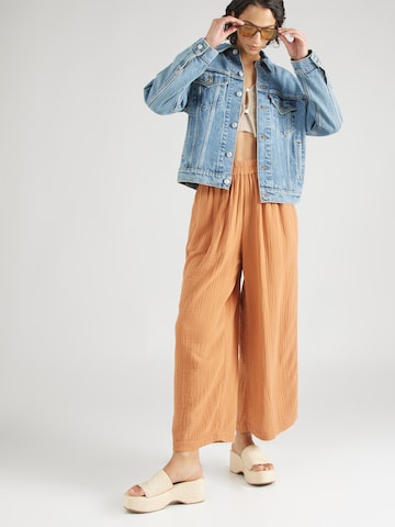 Wide leg Pantaloni 'FOLLOW ME' di BILLABONG in arancione