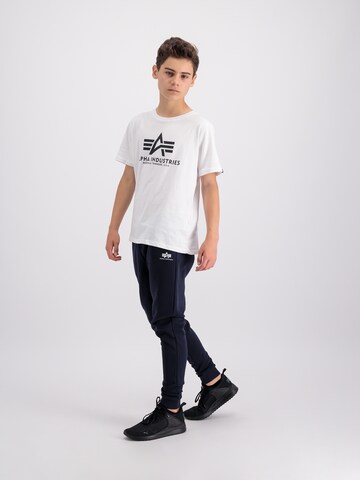 ALPHA INDUSTRIES Tapered Trousers in Blue