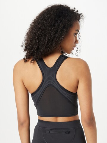 Reebok Sporttop in Schwarz