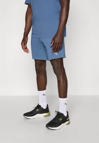 PUMA Regular Workout Pants 'TAD Essentials' in Blue: front