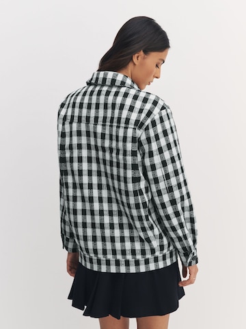 Next Tussenjas in Blauw