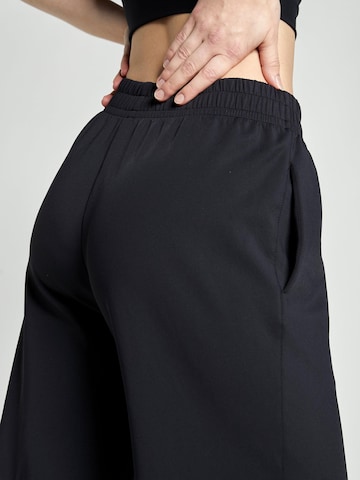 SPORTKIND Flared Workout Pants 'Trainingshose weit' in Black