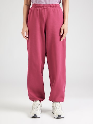 UNDER ARMOUR - Tapered Pantalón deportivo 'Icon Flc' en rojo: frente