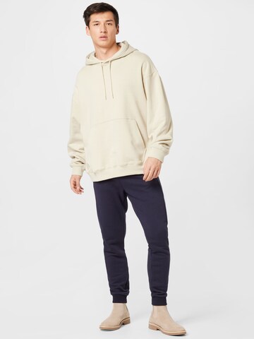 Sweat-shirt WEEKDAY en beige