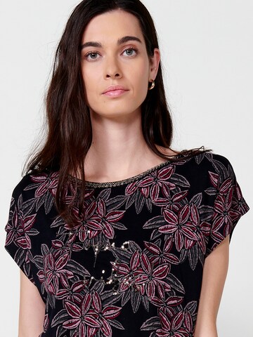 Tricou de la KOROSHI pe negru