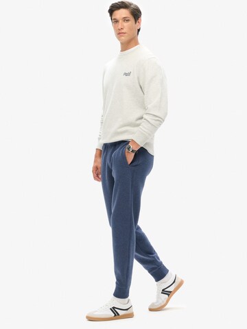 Superdry Tapered Broek 'Essential' in Blauw