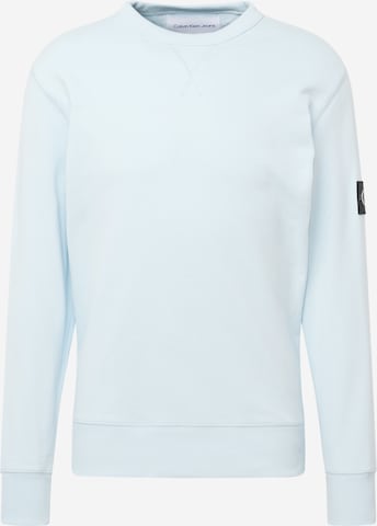 Sweat-shirt Calvin Klein Jeans en bleu : devant