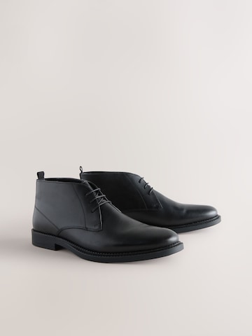 Next - Botines chukka en negro