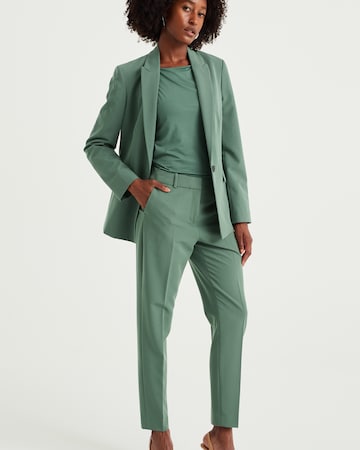 WE Fashion Slimfit Kalhoty s puky – zelená