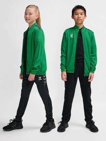 Hummel Sports sweat jacket in Green: front