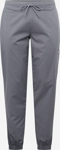 Reebok Tapered Sports trousers in Grey: front