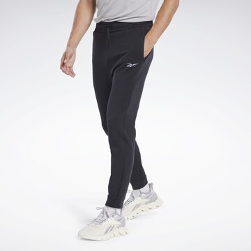 Reebok Regular Workout Pants in Black: front