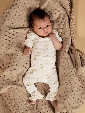 Lil'Atelier - Pijama entero/body en beige: frente
