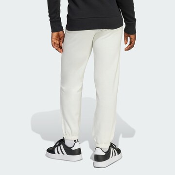ADIDAS SPORTSWEAR Tapered Sports trousers in White