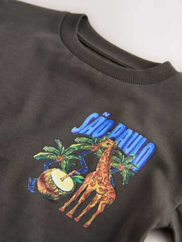 T-Shirt Next en gris